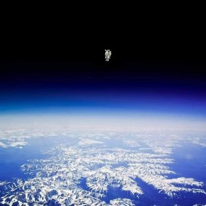 Astronaut Bruce McCandless II floating untethered away from the safety of the space shuttle..jpg